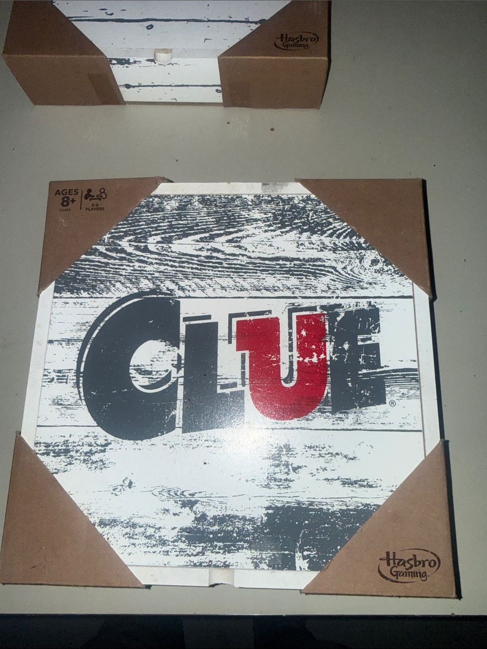 Clue Board Game by Hasbro Gaming - White, Gray & Red Box